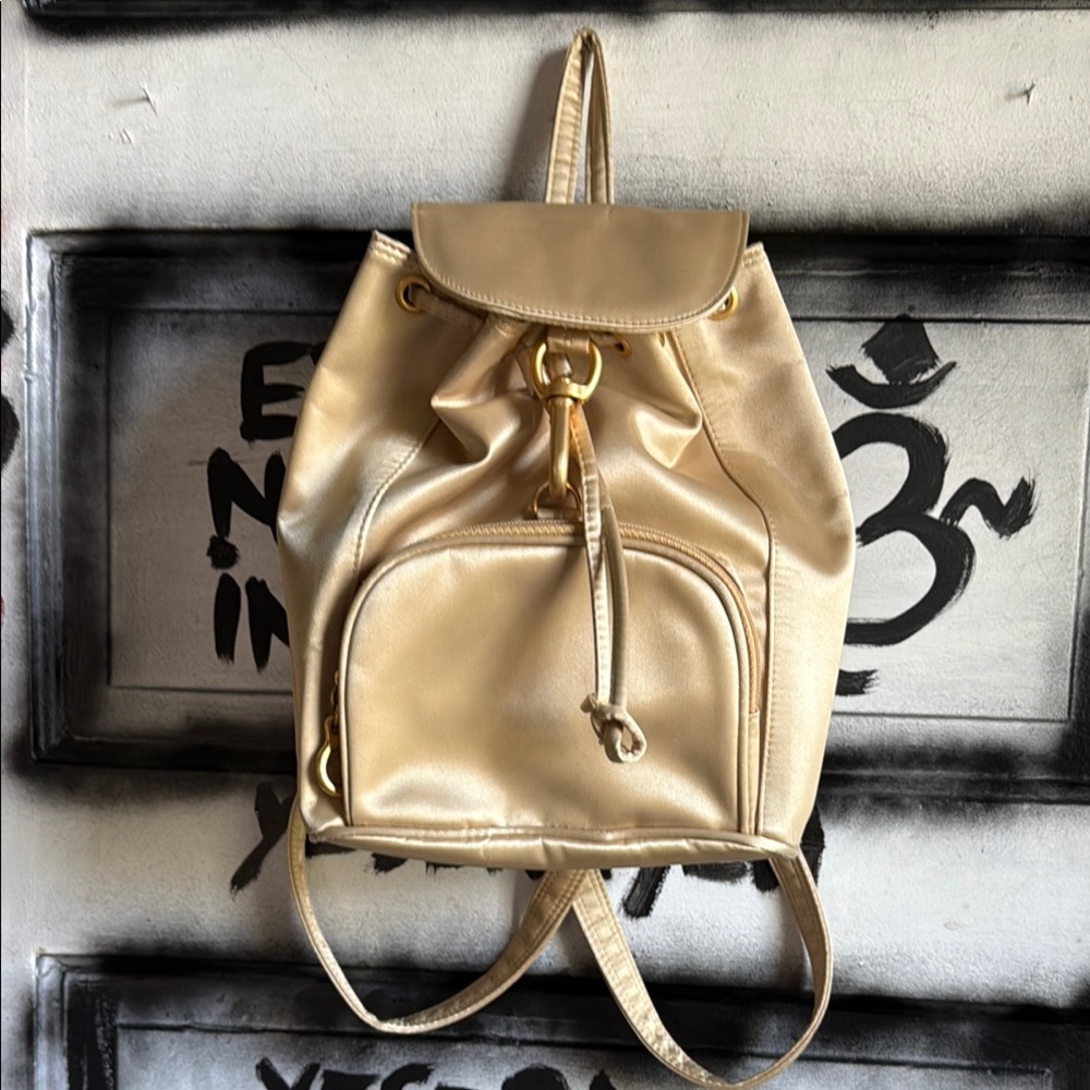 Cream Structured Backpack With Metallic Finish - image 1